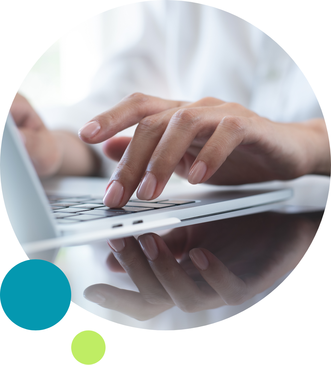 A person typing on a keyboard