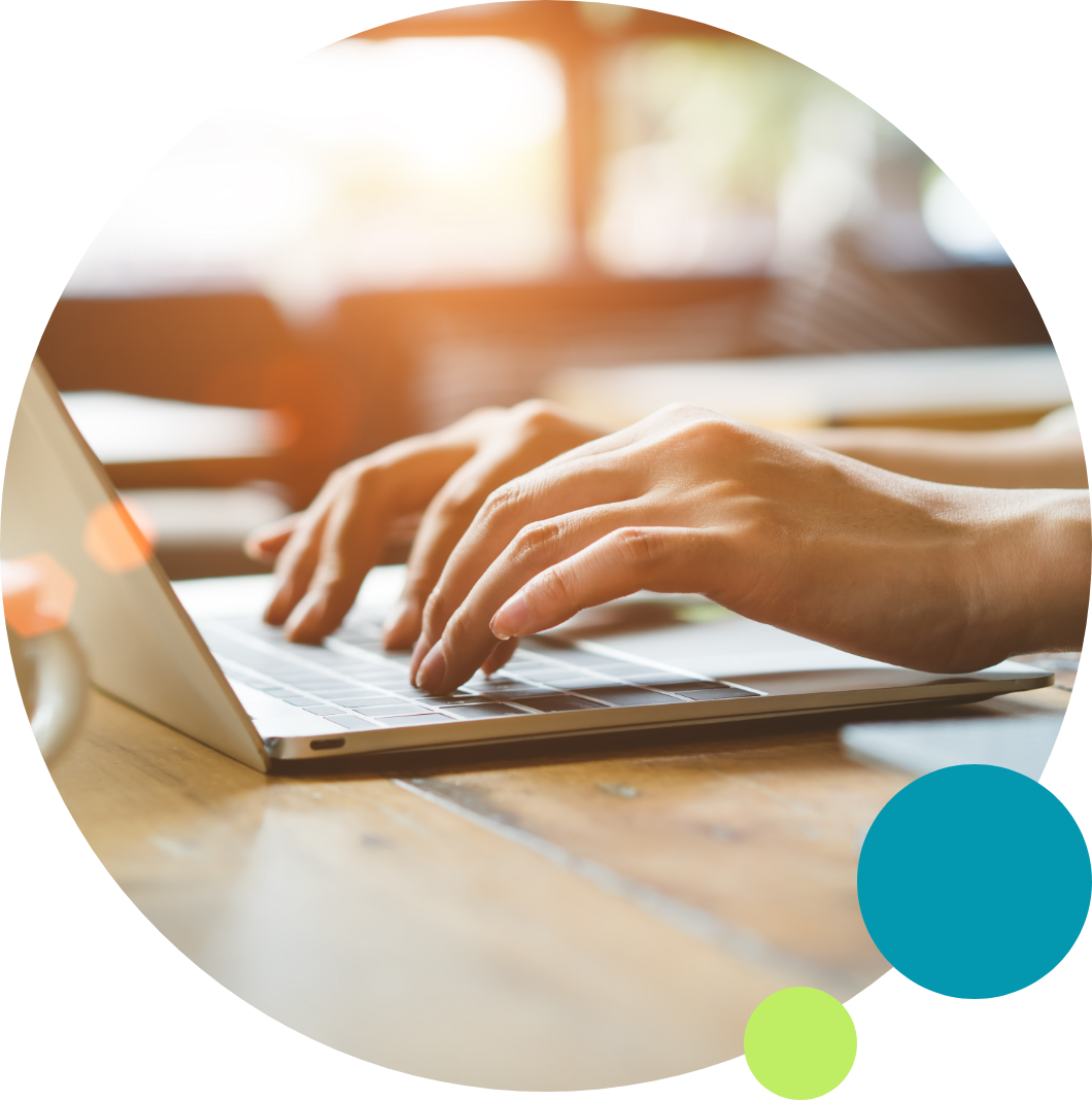 A person typing on a keyboard