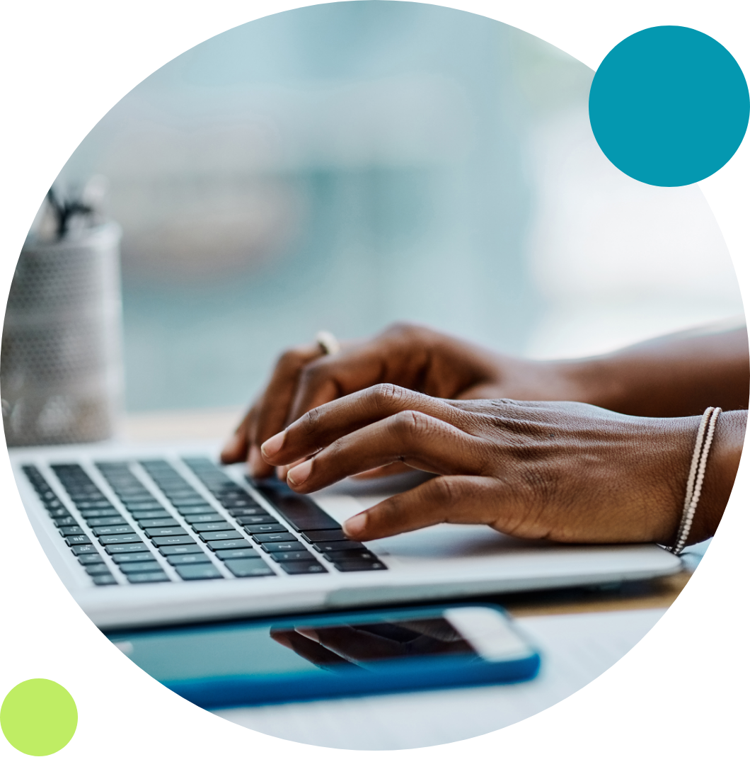 A person typing on a keyboard